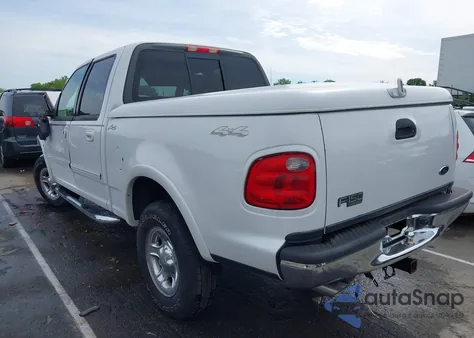 2002 Ford F-150 Lariat/Xlt z USA, uszkodzony, nr VIN 1FTRW08L72KB90519